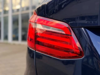 BMW 2 Serie Active Tourer 218i High Executive I Navigatie I Camera I Trekhaak I HUD I LED / 19