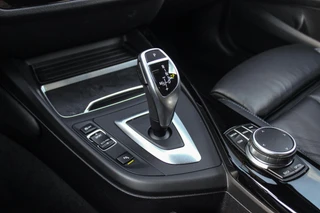 BMW 1-serie 120i Edition M Sport Shadow High Executive | 2e eigenaar | Driving Assistant | Schuif-/kanteldak | Camera | Harman Kardon | Keyless entry | LED | M sport remmen | PDC / 32
