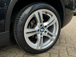 BMW X1 DRIVE20i CHROME LINE | AIRCO | NAVIGATIE | CRUISE | PDC | VELGEN | TREKHAAK | NAP / 23