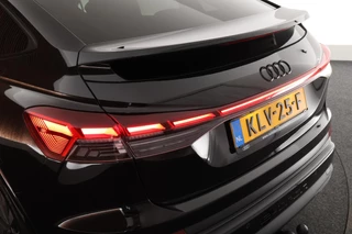 Audi Q4 Sportback e-tron 40 S edition 77 kWh SOH 93% Trekhaak Camera HUD Sonos Panoramadak Stoelverwarming Navigatie S-Line / 54