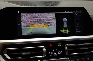 BMW 3 Serie Touring 320i High Executive M Sport Pakket Automaat  / Live Cockpit Professional / Leder / Achteruitrijcamera / DAB / Stoelverwarming / Hifi / Ambiance Verlichting / 18 Inch / LED / Chrome Line / Parkeersensoren voor+achter / Climate Control / 22