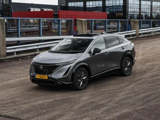 Nissan Ariya Evolve 91 kWh | SOH 99% | Panoramadak | Trekhaak | ACC | HUD | Voorstoelen verwarmd en geventileerd | Warmtepomp | 360 Camera | 19" / 10