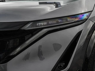 Nissan Ariya Evolve 91 kWh | SOH 99% | Panoramadak | Trekhaak | ACC | HUD | Voorstoelen verwarmd en geventileerd | Warmtepomp | 360 Camera | 19" / 56