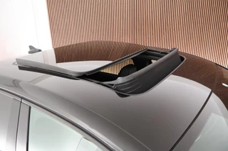 Audi Q4 Sportback e-tron 40 S edition 77 kWh SOH 93% Trekhaak Camera HUD Sonos Panoramadak Stoelverwarming Navigatie S-Line / 10