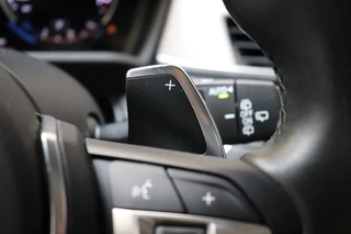 BMW X2 sDrive20i High Executive M Sport Pakket Automaat  / Navigatiesysteem Plus / Leder / Panoramadak / Stoelverwarming / LED / Harman Kardon / 19 Inch / Head-Up Display / Parkeersensoren voor+achter / Climate Control / Shadow Line / 32