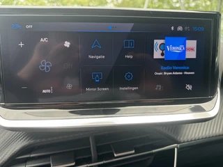 Peugeot e-2008 Envy EV 54kwh 156pk | Apple Carplay/Android Auto | Adaptieve Cruise Control | Lichtmetalen velgen 17 inch | Draadloos laden / 26