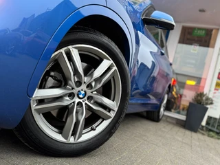 BMW X1 X1 sDrive20i High Executive M Sport I Automaat I HUD I LED I Stoelverw. I Sportstoel / 13