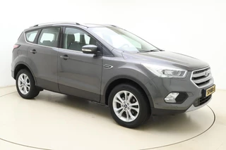 Ford Kuga 1.5 EcoBoost Titanium | Trekhaak | Achteruitrijcamera | Airco | Navigatie | Elektrische achterklep | Cruise control | Start/Stop bediening | Climate control | Parkeersensoren | Lederen/stof interieur | Stuurbediening / 9