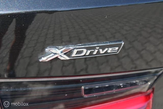BMW 3-serie Touring 320e xDrive/Led/Trekhaak/Navi/Tel/All seas/ / 15
