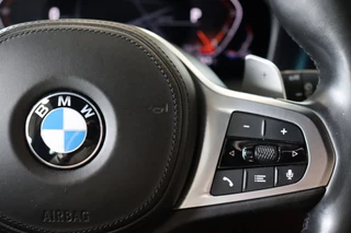 BMW 3 Serie Touring 320i High Executive M Sport Pakket Automaat  / Live Cockpit Professional / Leder / Achteruitrijcamera / DAB / Stoelverwarming / Hifi / Ambiance Verlichting / 18 Inch / LED / Chrome Line / Parkeersensoren voor+achter / Climate Control / 33