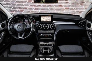 Mercedes-Benz C-klasse Estate 180 Prestige | Panoramadak | Trekhaak | LED | Stoelverwarming | Dodehoekdetectie | Dealeronderhouden / 2