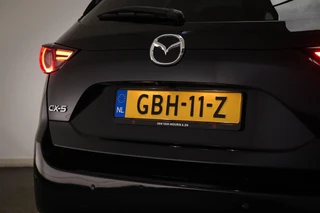 Mazda CX-5 2.0 SkyActiv-G 165 Skylease+ | ACHTERBANKVERWARMING | HEAD UP | DAB | 360 CAMERA | TREKHAAK | 19" / 28