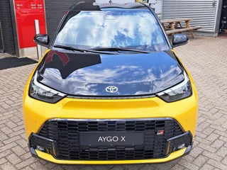 Toyota Aygo X Hybrid 115 GR Sport NIEUW IN DE SHOWROOM DIRECT LEVERBAAR 18'' LM-VELGEN PDC STOELVERWARMING AD-CRUISE / 4