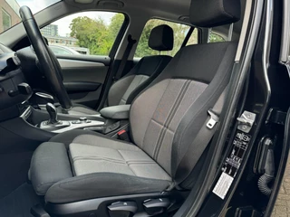 BMW X1 DRIVE20i CHROME LINE | AIRCO | NAVIGATIE | CRUISE | PDC | VELGEN | TREKHAAK | NAP / 14