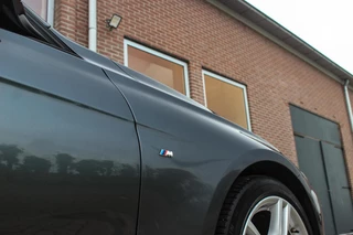 BMW 3-serie Touring 318i Centennial Executive M-sport | 2e eigenaar | HiFi audio | Navigatie | Bluetooth | Climate control | M-sportstuur | Cruise control | PDC | 18 inch | Trekhaak / 47