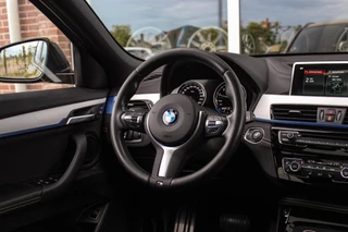 BMW X2 sDrive18i High Executive M-sport | 2e eigenaar | Driving Assistant | Panoramadak | 19 inch | Keyless entry | Head-up | Shadow line | HiFi audio | Stoelverwarming | Alcantara / 21