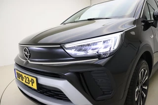 Opel Crossland 1.2 Turbo 110pk Level 4 | Panoramadak | Navigatie | Camera | Climate control | Parkeersensoren | Lichtmetalen velgen | Getint glas | DAB Radio | Cruise control | Bluetooth / 19
