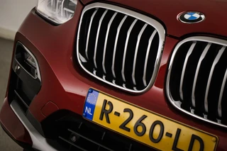 BMW X4 xDrive20i X-Line High Executive | PANORAMADAK | HEAD UP | STUURVERWARMING | TREKHAAK | 19" / 24