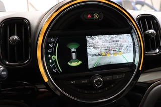 MINI Countryman John Cooper Works ALL4 Chili Automaat  / Navigatiesysteem Plus / Leder / Panoramadak / Harman Kardon / Stoelverwarming / Achteruitrijcamera / 19 Inch / Sportstoelen / Parkeersensoren voor+achter / Climate Control / Head-Up Display / 26