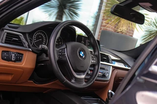 BMW 3-serie 316i Executive | Luxury Line | Sportstuur | Cruise control | Sportstoelen | Stoelverwarming | Climate control | Navigatie | Bluetooth | Regensensor | Lichtpakket | 18 inch | PDC / 34
