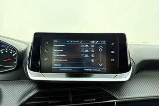 Peugeot 2008 1.2 PureTech Active Cruise Control l Airco l Apple Carplay/Android Auto l Parkeersensoren l Centrale Deurvergrendeling l Elektrische ramen l Elektrisch Verstelbare Spiegels / 28