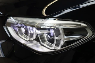 BMW iX3 High Executive 80 kWh Automaat  / Driving Assistant Professional / SOH 97% / Live Cockpit Professional / Trekhaak / Panoramadak / Adaptief Onderstel / Leder / Harman Kardon / Shadow Line / Head-Up Display / Adaptieve LED-koplampen / DAB / 20 Inch / 12