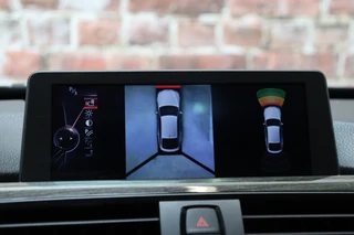 BMW 3 Serie Gran Turismo 335i xDrive High Executive M Sport Pakket Automaat  / Navigatiesysteem Professional / Panoramadak / Trekhaak / Leder / Innovatiepakket / 18 Inch / Shadow Line / Active Cruise Control met Stop en Go-functie / Stoelverwarming / Climate Control / Xenon / Extra Getint Glas / 23