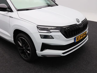 Skoda Karoq 1.5 TSi 150 Pk Automaat Sportline Business | Trekhaak | Stoel/Stuurverwarming | Panorama dak | Matrix LED | Camera | CarPlay | Parkeersensoren | 18 Inch | 50.137 Km !! / 13
