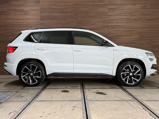 Skoda Karoq 1.5 TSI DSG 4x4 Sportline Business | 1800KG Trekgewicht | Carplay | Sportstoelen | Camera / 12