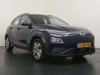 Hyundai Kona EV Comfort 64 kWh - SOH 94,5%  - Airco - Keyless Entry - Apple CarPlay/Android Auto - Achteruitrijcamera - Virena Zekerheidspakket €895,- / 12