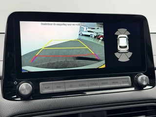 Hyundai Kona EV Premium 64 kWh SOH 90,1% Warmtepomp | Leer | Head-Up | Elektr. Stoelen | Adaptive Cruise / 7