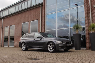BMW 3-serie Touring 318i Centennial Executive M-sport | 2e eigenaar | HiFi audio | Navigatie | Bluetooth | Climate control | M-sportstuur | Cruise control | PDC | 18 inch | Trekhaak / 9