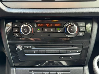 BMW X1 DRIVE20i CHROME LINE | AIRCO | NAVIGATIE | CRUISE | PDC | VELGEN | TREKHAAK | NAP / 11