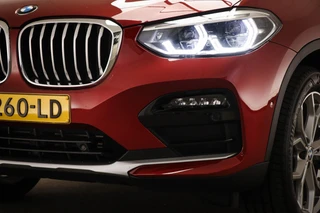 BMW X4 xDrive20i X-Line High Executive | PANORAMADAK | HEAD UP | STUURVERWARMING | TREKHAAK | 19" / 25