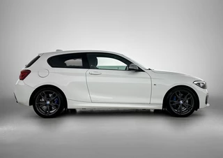BMW 1-serie M140i xDrive | Stoelverwarming | Cruise Control | Navigatie / 9