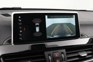 Bmw X1 sDrive20i Orange Edition 192PK Pano | Leder | HUD | Stoelverwarming / 18