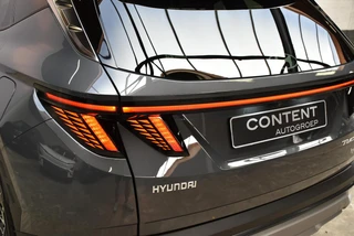 Hyundai Tucson 1.6 T-GDi HEV Aut. Premium Sky |Schuifdak |Beige Leder . / 39