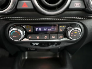 Nissan Juke 1.6 Hybrid Tekna Leer | 19 inch | Winterpack | BOSE / 28