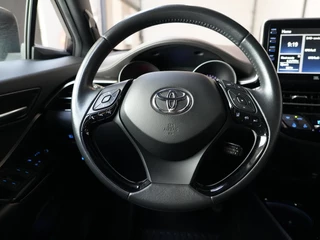Toyota C-HR 1.8 Hybrid Executive ✅All Season✅Navi✅Dodehoek✅Camera✅Stoelverwarm.✅Keyless✅Cruise✅Clima✅ / 17