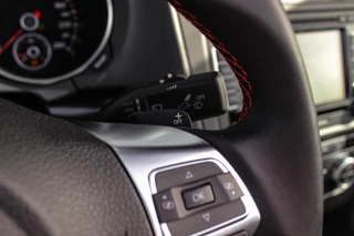 Volkswagen Golf Cabrio 2.0 TSI GTI | 2e eigenaar | DSG | Xenon | Stoelverwarming | Climatronic | Cruise control | Navigatie | Bluetooth | PDC | 18 inch Detroit | Origineel / 19