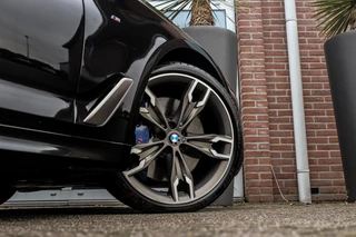 BMW 5-serie M550d xDrive High Executive | 2e eigenaar | Driving Assistant Plus | Innovation pakket | Stoelverwarming & -ventilatie | Stuurverwarming | Harman-kardon | 360 camera / 59