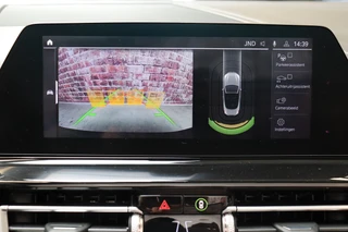 BMW 8 Serie M850i xDrive High Executive M Sport Pakket Automaat  / Live Cockpit Professional / Individual Leder Merino / Driving Assistant / Carbon Exterieur / Active Steering / Laserlight / M Sportremsysteem / Active Cruise Control met Stop en Go-functie / M Sportdifferentieel / Shadow Line / Achteruitrijcamera / Harman Kardon / 27