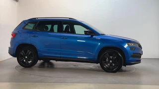 Skoda Karoq 1.5 TSI 150pk ACT Sportline Business Camera Trekhaak Sfeerverlichting Stoelverwarming Adaptive Cruise LED / 12
