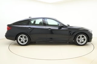 BMW 3-serie Gran Turismo 320i High Executive Edition | Lederen bekleding | M Sport pakket | Trekhaak | Stoelverwarming | Keyless | Navigatie | Weinig kilometers | Climate control / 10