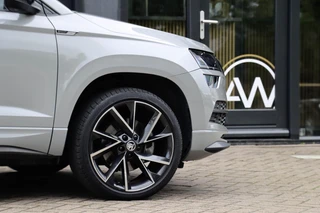 Skoda Karoq 1.5 TSI Sportline Business 150PK DSG Virtual | Camera | 19 inch | Navigatie / 16