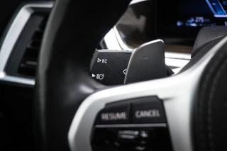BMW X5 xDrive50e M-Sport | PANORAMADAK | HEAD UP | HOUTAFWERKING | ACHTERBANKVERWARMING | TREKHAAK | 360 CAMERA | 21" / 44