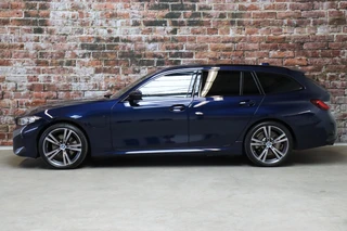 BMW 3 Serie Touring 330e High Executive M Sport Pakket Automaat  / Live Cockpit Professional / SOH 93 % / Driving Assistant / Panoramadak / Trekhaak / Leder / Harman Kardon / Innovation Pack / Parking Assistant / Travel Pack / Curved Display / 19 Inch / Shadow Line / 4
