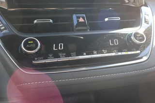 Toyota Corolla Touring Sports 1.8 HYBRID NL-AUTO ALL-SEASON AD-CRUISE APPLE/ANDROID CAMERA CLIMA NAVI / 26