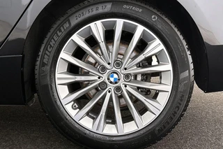 BMW 2-serie Gran Tourer 216i Business Edition Plus Trekhaak Stoelverwarming Head-Up Harman Kardon / 24