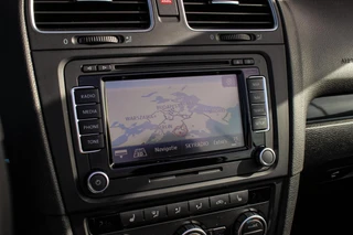 Volkswagen Golf Cabrio 2.0 TSI GTI | 2e eigenaar | DSG | Xenon | Stoelverwarming | Climatronic | Cruise control | Navigatie | Bluetooth | PDC | 18 inch Detroit | Origineel / 24